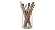 © no one - Collection of various used artist paint brushes with wooden handles stands upright in a clear glass jar on a white background
