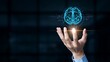 © HAFIZUL - Artificial intelligence concept illustration of a glowing brain circuit over a hand
