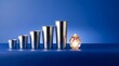 © Kurniawan - Row of stainless steel cups increasing in size next to illuminated multifaceted crystal on deep blue background.