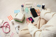 © Pixel-Shot - Healthcare costs and medical debt, person using smartphone and credit cards to pay for prescription medication and nebulizer equipment at home