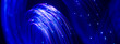 © Mclittle - Glowing fiber arch with cascading digital particles on blue background 3D