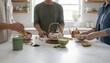 © QuoDesign - Group of friends preparing and sharing traditional Japanese matcha tea in a bright kitchen