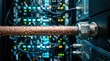 © DigitalSpace - Condensation on a copper liquid cooling pipe feeding a dense server rack in a data center