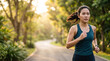© Sweettymojidesign - Asian woman jogging in park feeling motivated doing fitness exercise during morning sunlight at outdoor urban public garden location