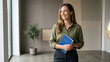 © Veggymulyanto - Professional Business Woman Holding a Notebook