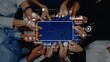 © InfiniteFlow - A diverse group of hands assemble a puzzle together, symbolizing teamwork, creativity, and digital strategy in a modern business setting. Raster