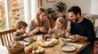 © Asril - Happy young family enjoying a healthy breakfast together at home in the morning.