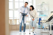 © Pixel-Shot - Medical diagnosis and patient consultation, doctor explaining mri scan results to a woman with crutches in a clinic office for healthcare treatment