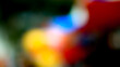 © josh - Vibrant abstract bokeh background with glowing multicolored light spots of red yellow and blue for modern digital art and creative design