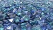 © Muhammad Tahir Khan - A large collection of sparkling blue and teal gemstones arranged together in a dense pile of faceted jewels with pile many loose