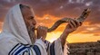 © CaptureCollabStudios - Jewish man wrapped in a tallit blowing the shofar horn at sunset in a desert landscape