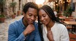 © dimamoroz - Happy young Black couple gently touching heads with closed eyes and genuine smiles, enjoying an intimate moment outdoors during golden hour sunset.