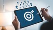 © Sumi - A digital marketing and business concept featuring a tablet showing a target and rising arrows representing strategy and success