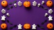 © mdsultan - Festive Halloween flat lay border featuring glowing jack-o'-lanterns, cute ghosts, skulls, and bat silhouettes on a vibrant purple background, offering ample copy space.