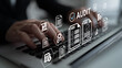© InfiniteFlow - A business professional types on a laptop with icons symbolizing auditing and financial documents, showcasing the importance of digital analysis and efficient management. Ledger