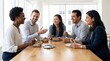 © The Subekti - Diverse coworkers sharing a healthy lunch and talking in a bright