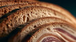 © Jhati - Close up shot of thin crispy bread slices layered on a rustic dark wooden table with sliced bread