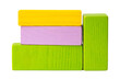 © fotofabrika - Wooden blocks arranged in different colors and sizes on a white background