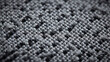 © Designbd25 - Close-up macro texture of grey woven fabric with small fibers