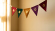 © photo for everything - Colorful festive bunting flags with gold star symbols hanging indoors in soft daylight for traditional holiday celebration decoration theme