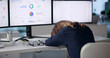 © Andrey Popov - Compliance Officer Tired While Reviewing Risk Dashboard