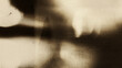 © Uuganbayar - Cinematic film grain texture with soft light leaks, vintage analog photography aesthetic on dark background, subtle noise overlay for retro video editing, filmmaking, nostalgic visuals