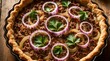 © Pete - Delicious savory meat pie with onion rings, fresh parsley on top. Homemade gluten free tart with beef, pork, cream cheese filling in baking dish. Tasty cooked pastry meal for lunch dinner served on
