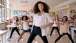 © shobakhul - A group of diverse children engaged in a dance class at school.