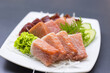 © leungchopan - Fresh tuna sashimi platter served on white plate with wasabi 