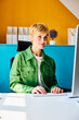 © BusinessClass by W61 - A confident businesswoman works on her computer at the office