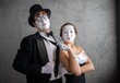 © Nomad_Soul - Mime couple posing together with a vintage rotary telephone