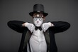 © Nomad_Soul - Male mime artist performing classic invisible wall illusion
