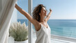 © piai - Joyful Woman Opening Curtains in Luxurious Modern Residence at Sunrise for Lifestyle Campaigns