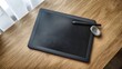 © Rieff - Digital graphics tablet with stylus pen and eraser on wooden animation studio desk