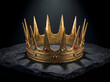 © idea Stock - Ancient Golden Royal Crown with Red and Green Gemstones on Dark Stone Slab