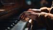 © CooLKenG - Elderly person hands playing an old wooden piano keyboard in warm indoor lighting