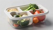© GC Atiq - Surreal sustainable packaging concept showing a food container dynamically reorganizing its structure to protect stored produce