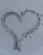 © Moritz Wolf/imageBROKER - Heart on the beach, drawn into the sand, black sand, La Palma, Canary Islands, Spain