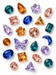 © JAHIDUL - Multicolor collection of assorted gemstone cuts including round oval butterfly and flower shapes isolated on white background for luxury jewelry design assets.