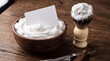 © Studio Fiuza - Mockup Shaving kit mockup with blank card in foam on wooden table