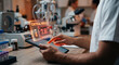 © Akash Tholiya - Clinician hand on tablet with critical lab result alert hologram, red flagged value and warning icon, medical laboratory notification and patient safety technology concept