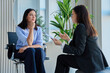 © Valerii Honcharuk - Pensive woman patient listening to female psychologist at therapy