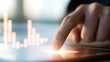 © photo for everything - Close up of a business person finger touch digital tablet screen to analyze stock market graph data and financial growth success report