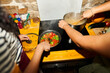 © Alvaro Lavin/Stocksy - Two people cooking healthy meal with fresh vegetables
