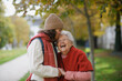 © Halfpoint - Portrait of a granddaughter on an autumn walk in the park with her grandmother.