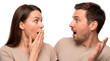 © jstecladista - Two adults react with surprise, sharing an astonished moment against a clean white background
