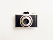 © Tetra Images - Studio shot of 1950s era rangefinder camera