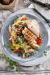 © Foodlovers - Grilled chicken breast with quinoa salad and fresh vegetables