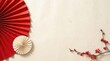 © MDSHAHADAT - Traditional chinese new year decorations with red fans and plum blossoms on a neutral background
