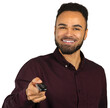 © fotofabrika - Man smiles while holding a remote control in a studio setting during a photoshoot